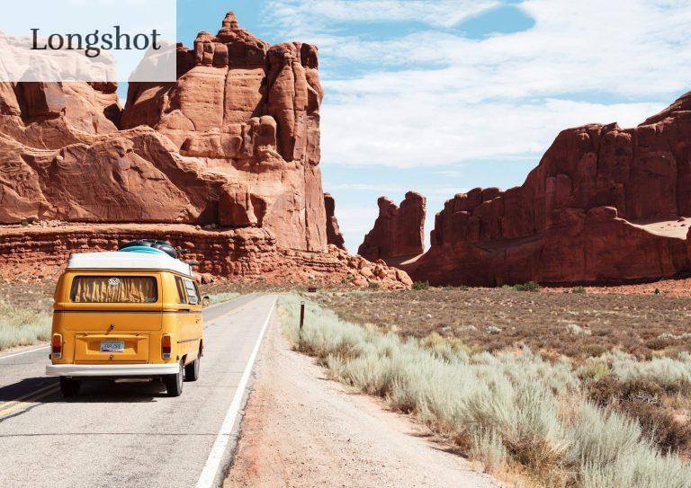 yellow Volkswagen van on road