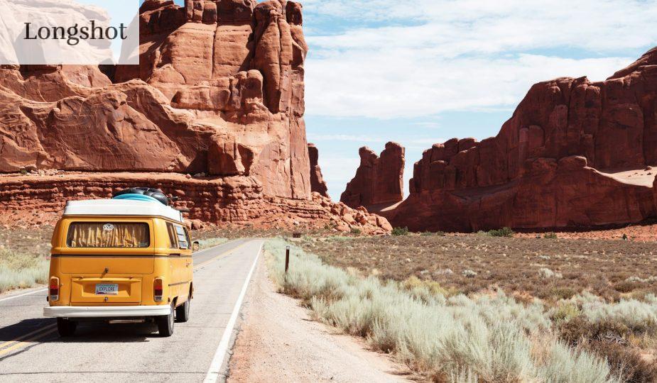 yellow Volkswagen van on road