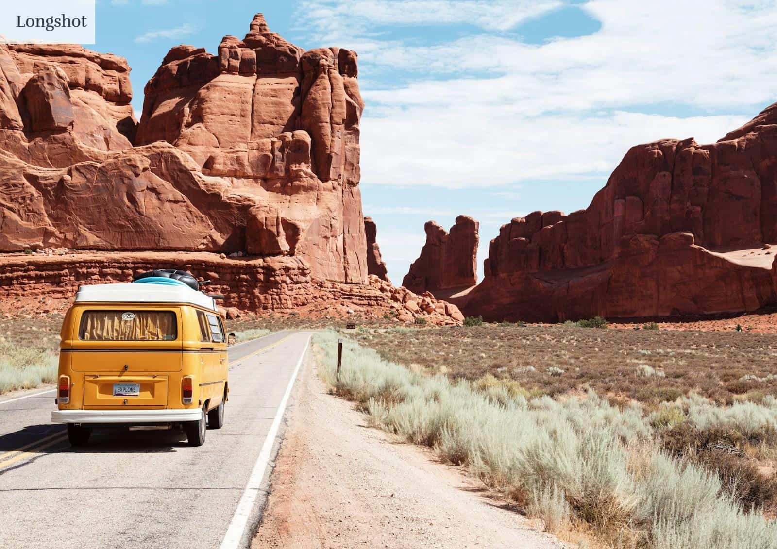 yellow Volkswagen van on road