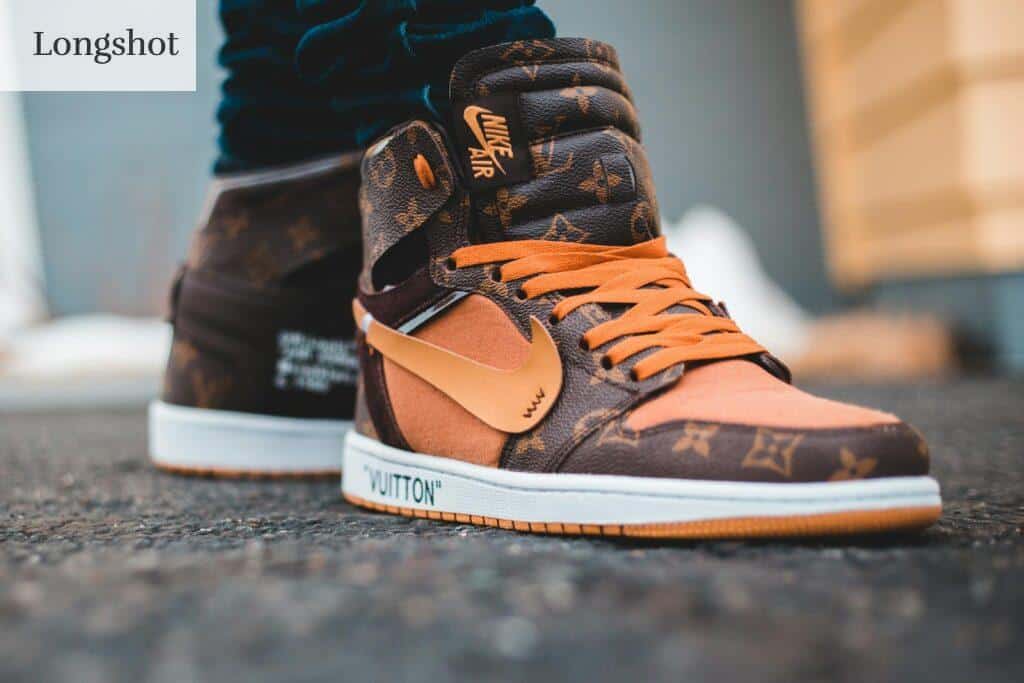 Close-up of luxury Nike Air sneakers with Louis Vuitton design, showcasing style and fashion detail.