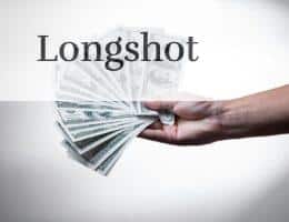 person holding 100 US Dollar banknote
