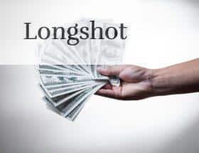 person holding 100 US Dollar banknote