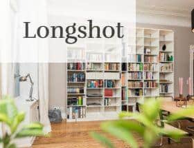 white wooden book shelves on brown wooden parquet floor