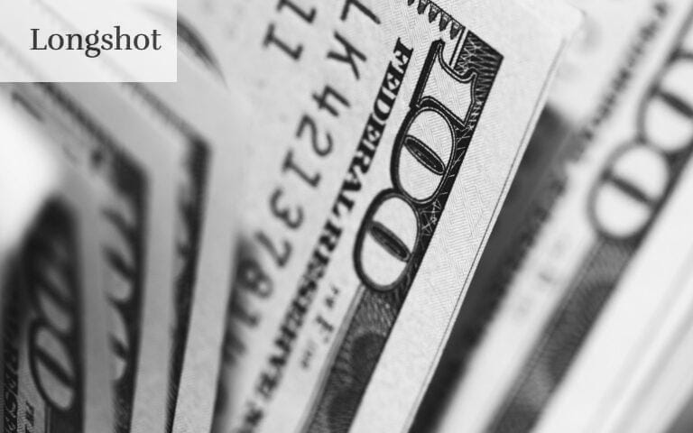 closeup photo of 100 US dollar banknotes